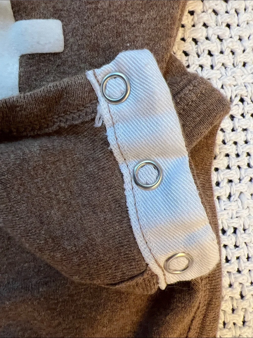 Carter’s | Brown Football-Stitch Long-Sleeve Baby One-Piece Size 3 Months
